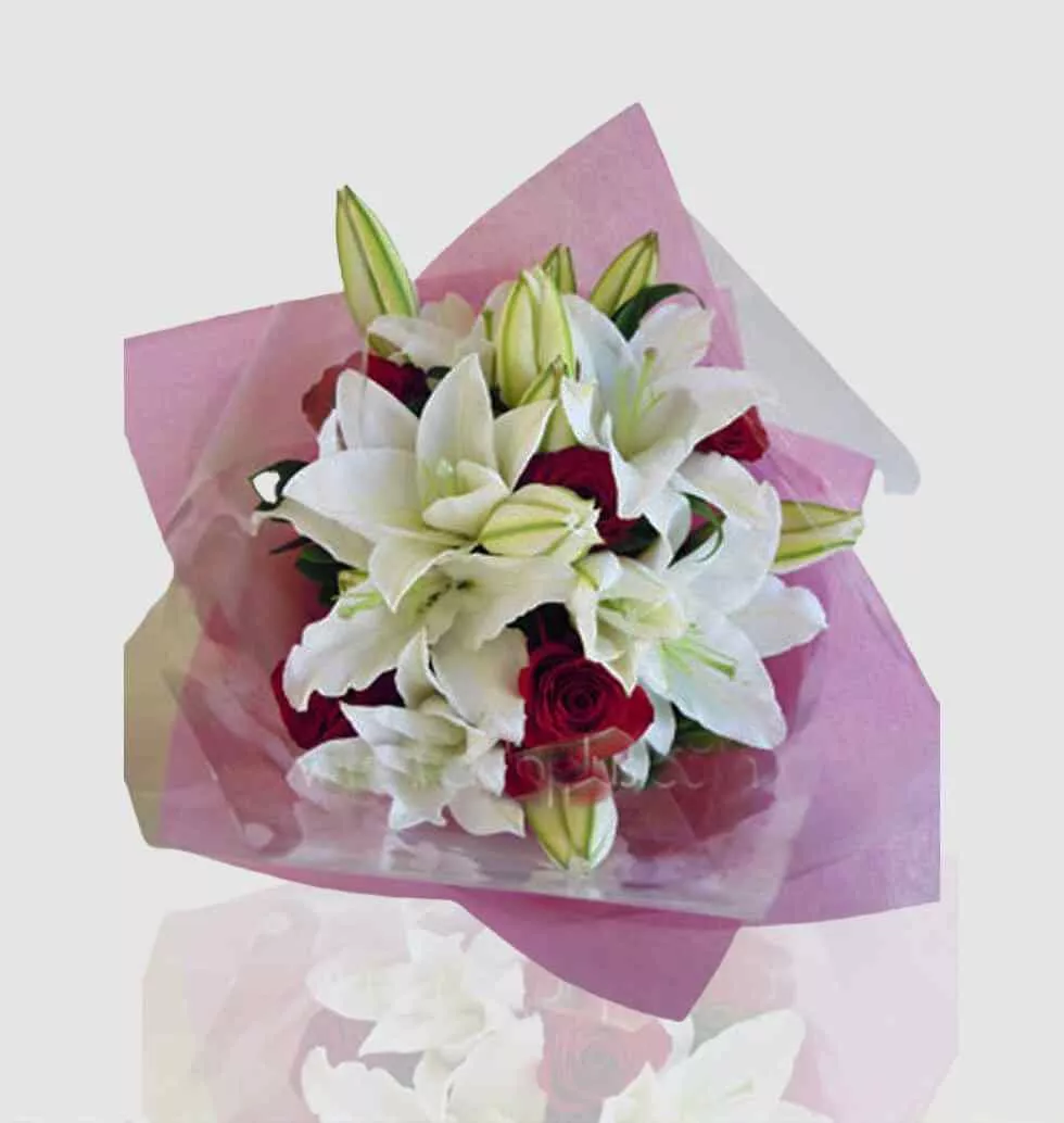 Arrangement Of Roses And Lilies