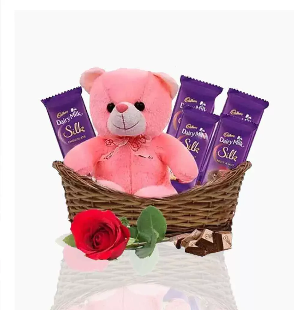 Teddy And Roses In A Basket