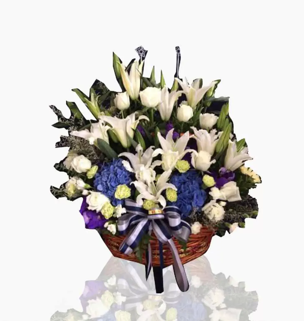 Orchids In White And Blue In A Vase